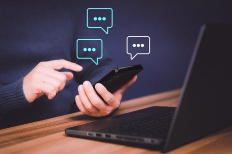 Young,Man,Hand,Using,A,Smartphone,Typing,Live,Chat,Chatting